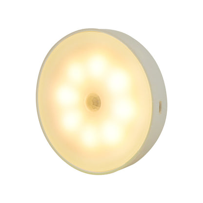 Round warm white motion-sensor night light with 8 LEDs and center motion sensor