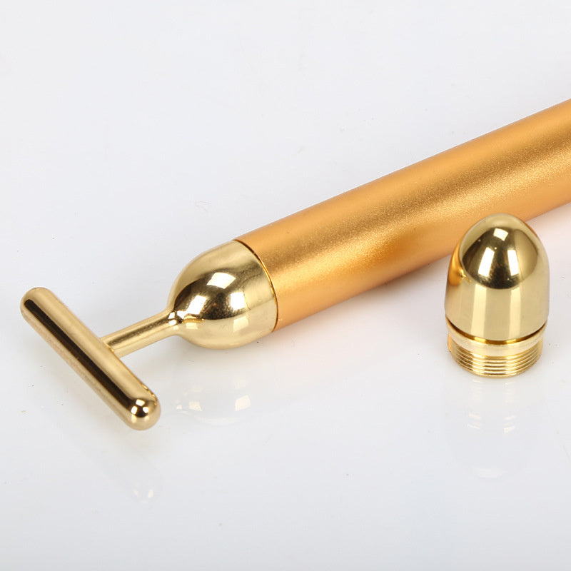 Electric T-bar face massager with 24K gold plating for wrinkle reduction