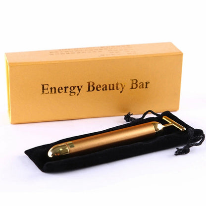 24K gold facial roller massager showing ergonomic T-shape design