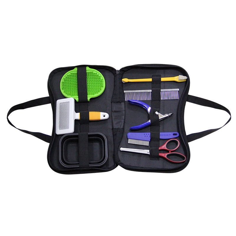 Complete At-Home Grooming Kit open on white: slicker brush, rubber bath brush, combs, nail clipper, scissors, toothbrush and collapsible bowl in zip case